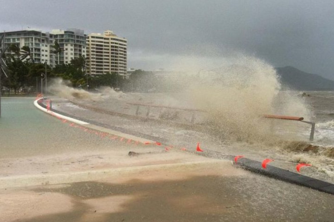 File photo of waves crashing on the Cairns waterfront during Cyclone Yasi. North Queensland is bracing for Cyclone Gabrielle which has formed off the coast but is not expected to make landfall.(Photo: ABC)