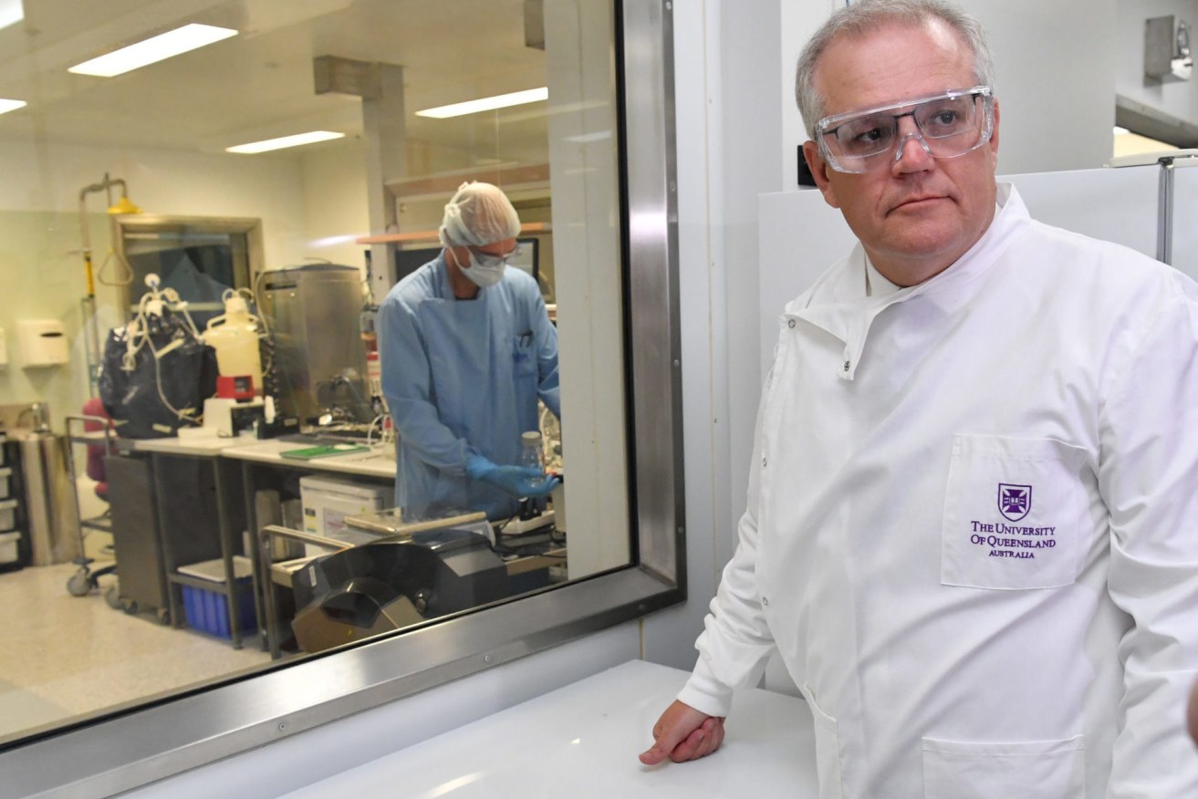 Prime Minister Scott Morrison during a recent tour of the University of Queensland Vaccine Lab in Brisbane. (AAP Image/Darren England) 