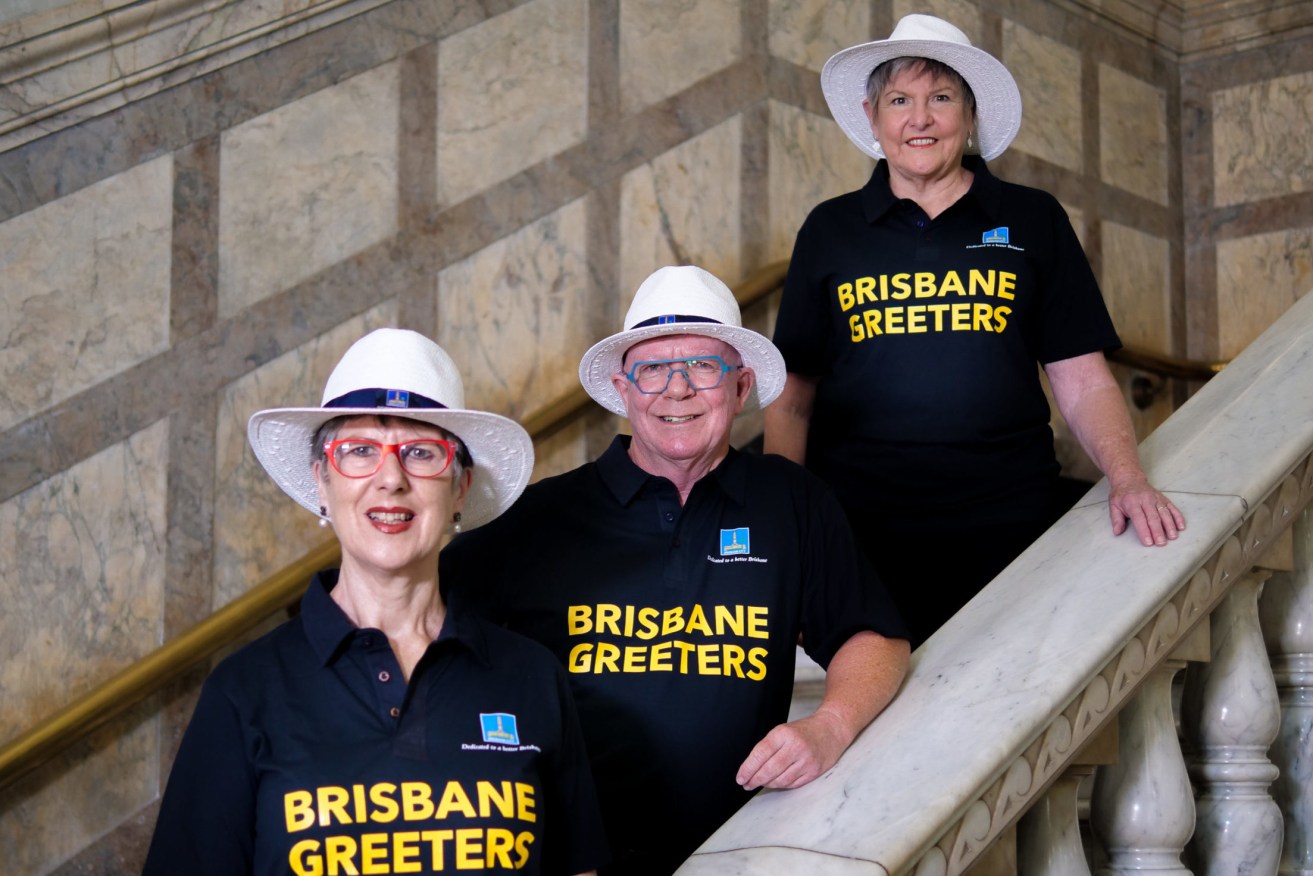 Brisbane Greeters, including volunteers Louise Scott, Blair Alsop and Sue Hammond will be back on the streets next month. Photo: BCC
