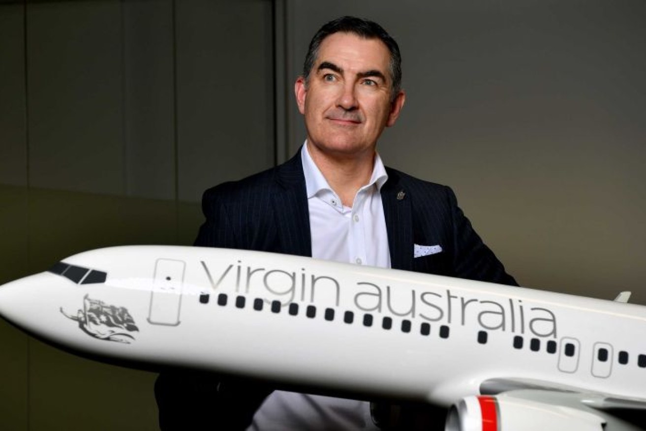 Outgoing Virgin Australia chief executive Paul Scurrah says he is not emotional about having to step aside under new owner Bain Capital. (Photo: AAP: Joel Carrett)