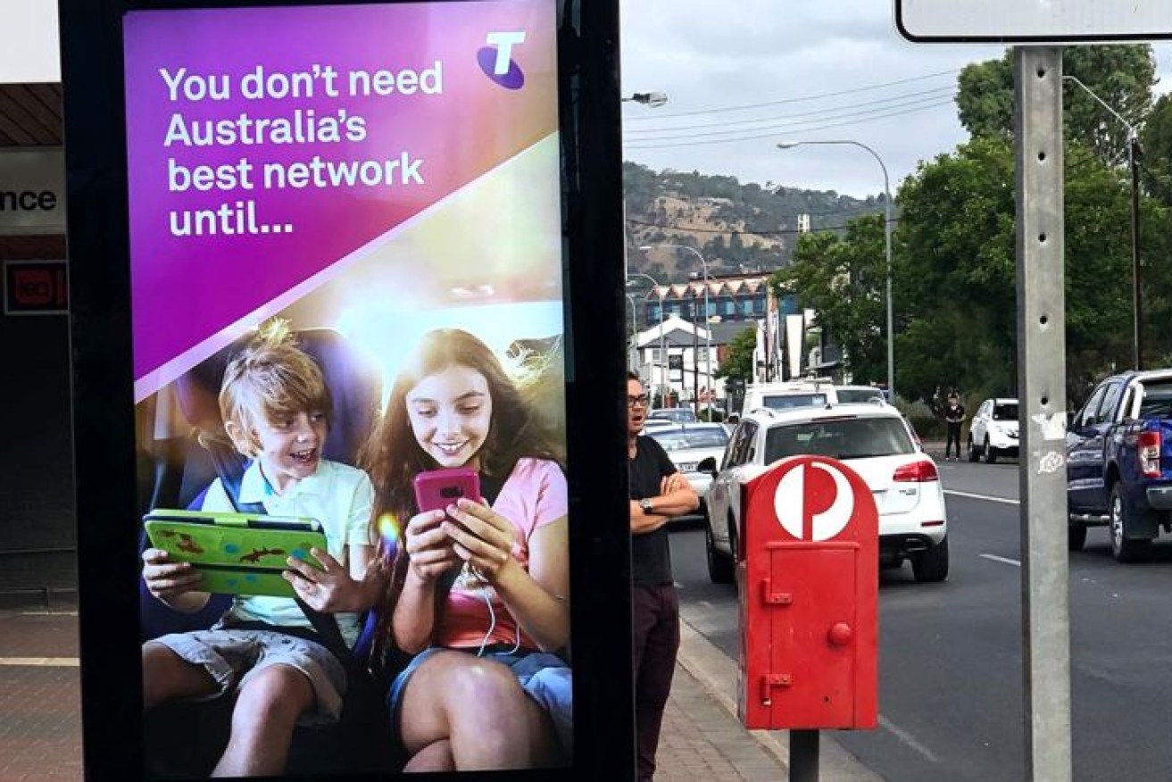 Brisbane City Councl has foiled a plan by Telstra to install large advertising billboards at pay phone sites. Photo: ABC