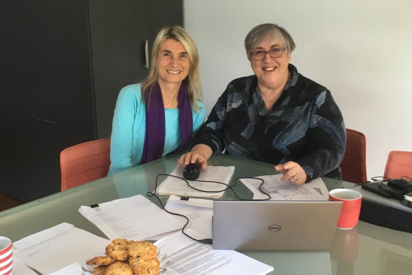 Brisbane GP Dr Johanna Skinner and editor, Jane Connolly, at work compiling their anthology, Stories From the Heart (Photo: Jo Skinner)