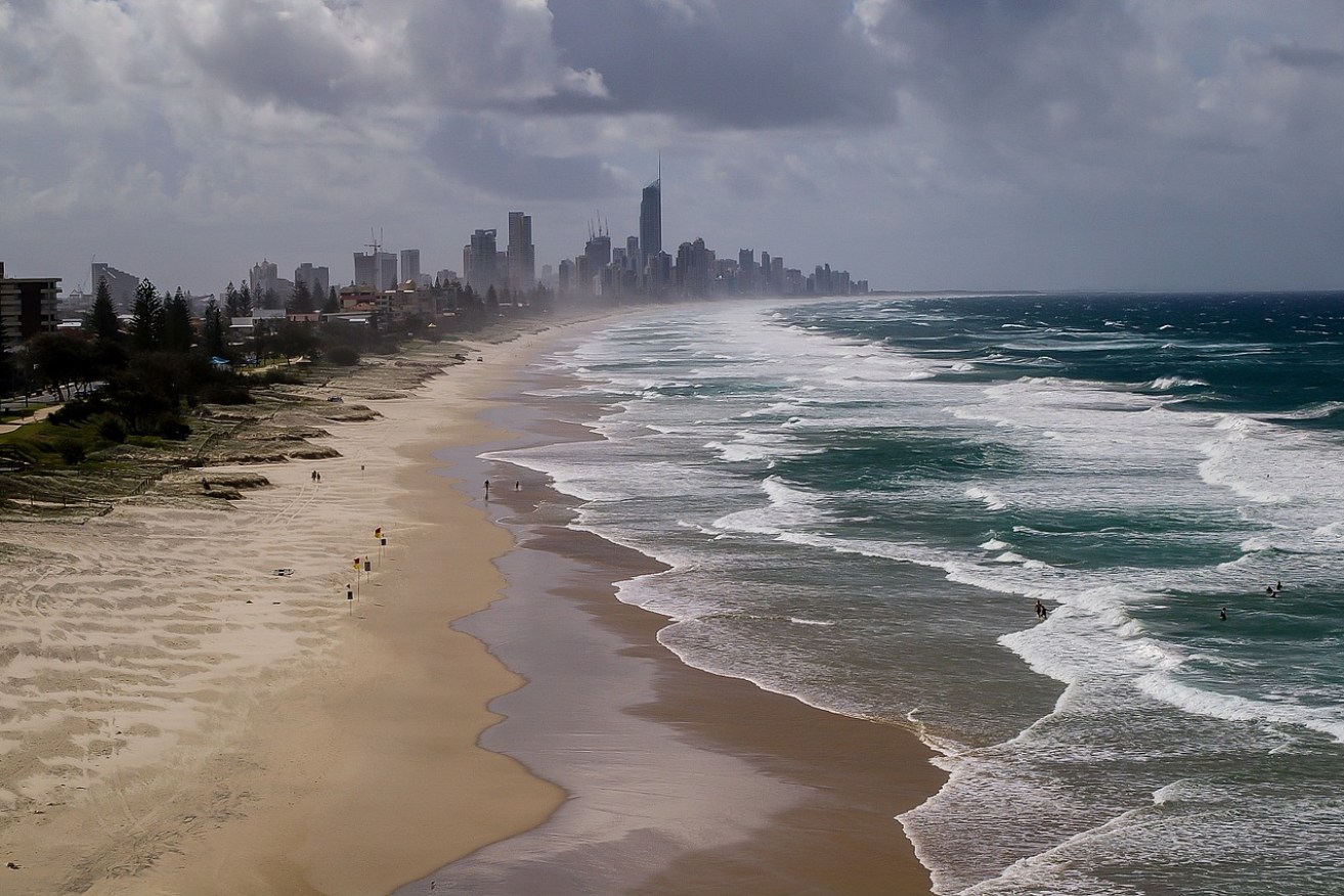 Gold Coast beaches have reopened after three drownings over the weekend.