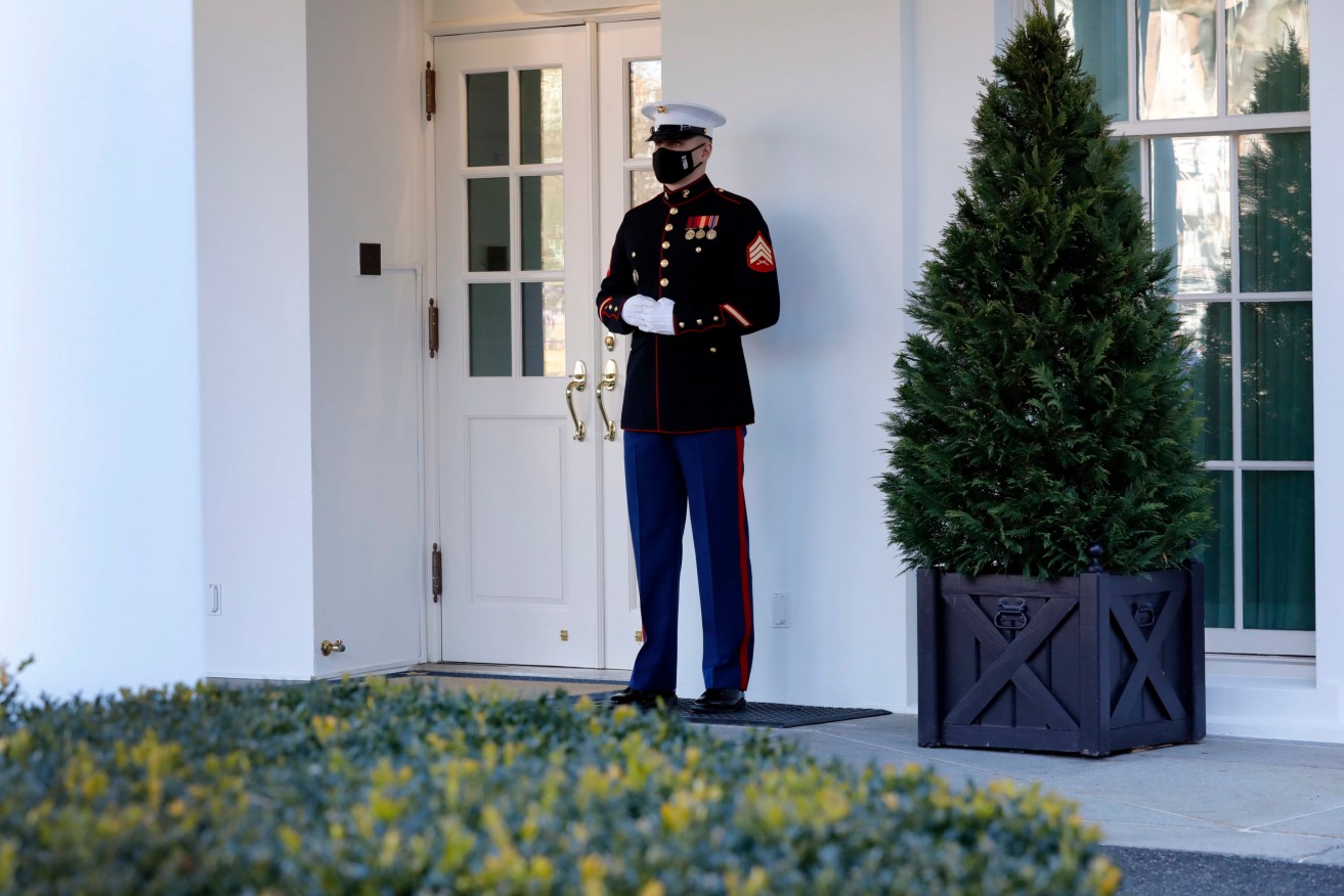 A Marine stands on duty outside the West Wing while US President Donald J. Trump is in Oval Office of the White House.  (Photo: EPA/Yuri Gripas / POOL)