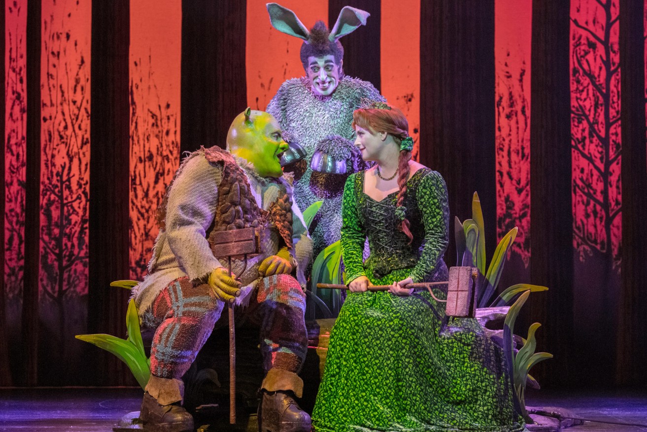 Ben Mingay as Shrek, Nay Jobe as Donkey and Lucy Durack as Princess Fiona in Shrek The Musical, which opens at QPAC tonight. (Photo: Brian Geach)