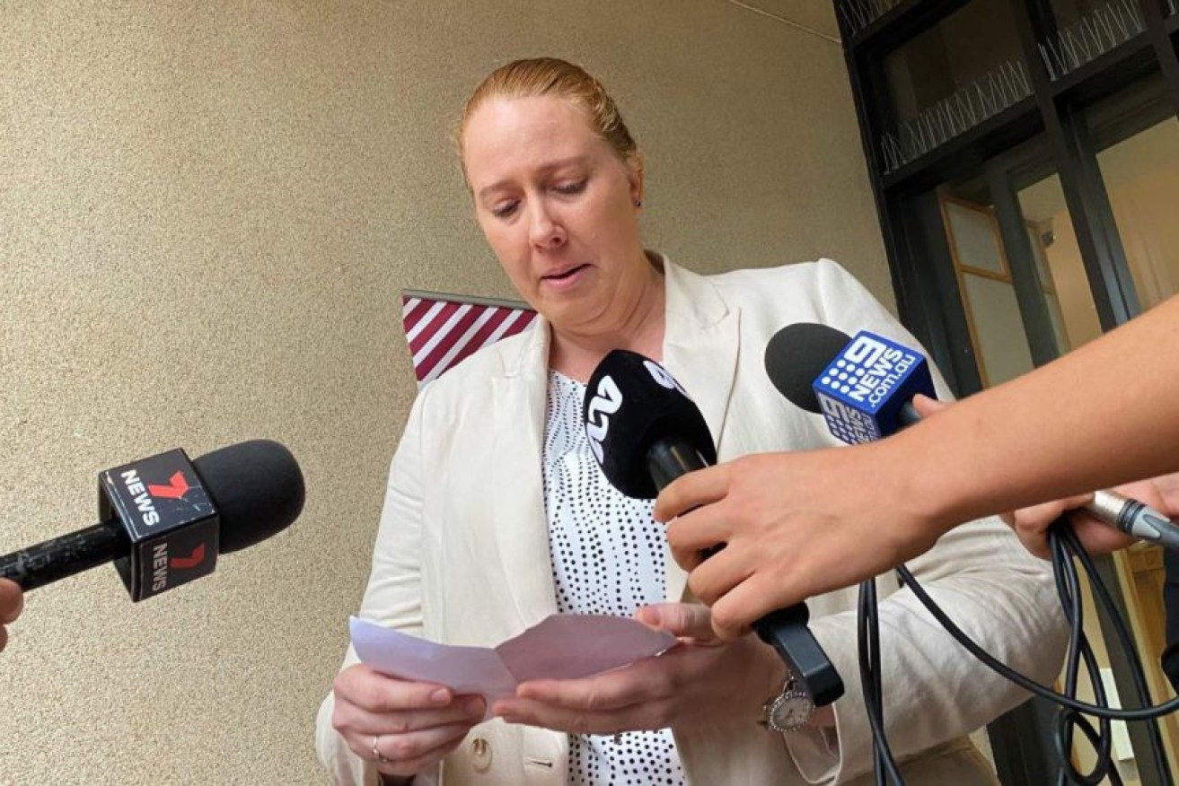 Dionne Batrice Grills read a statement outside the Cairns Magistrates Court after having a charge of manslaughter dropped. Photo: ABC News/Mark Rigby