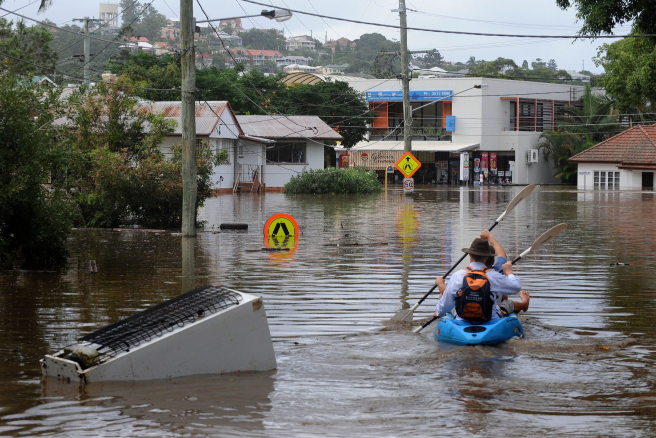 New data suggests as many as 1 million Australian homes are flood-prone, most of them in Queensland. (AAP Image/Dave Hunt) 