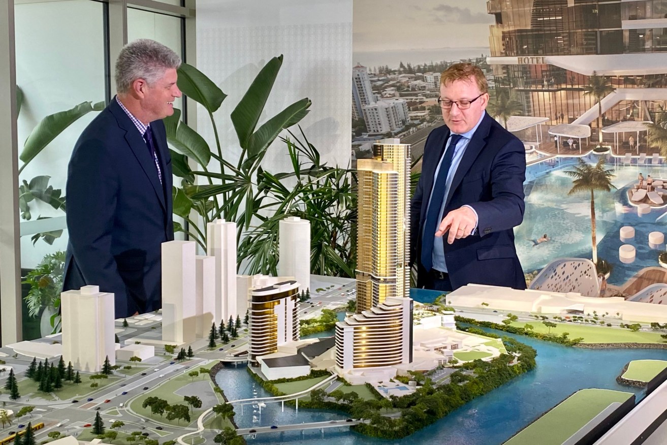 Star Entertainment Queensland chief Geoff Hogg and Tourism Minister Sterling Hinchliffe (left) unveil plans for the company's new 63-storey tower. (Photo:: Katrina Beikoff)