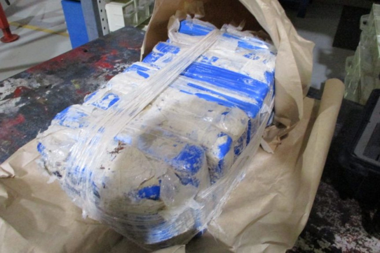 Packages of white powder washed up on Hinchinbrook Island. (Photo: Supplied: Qld Police Service, ABC)