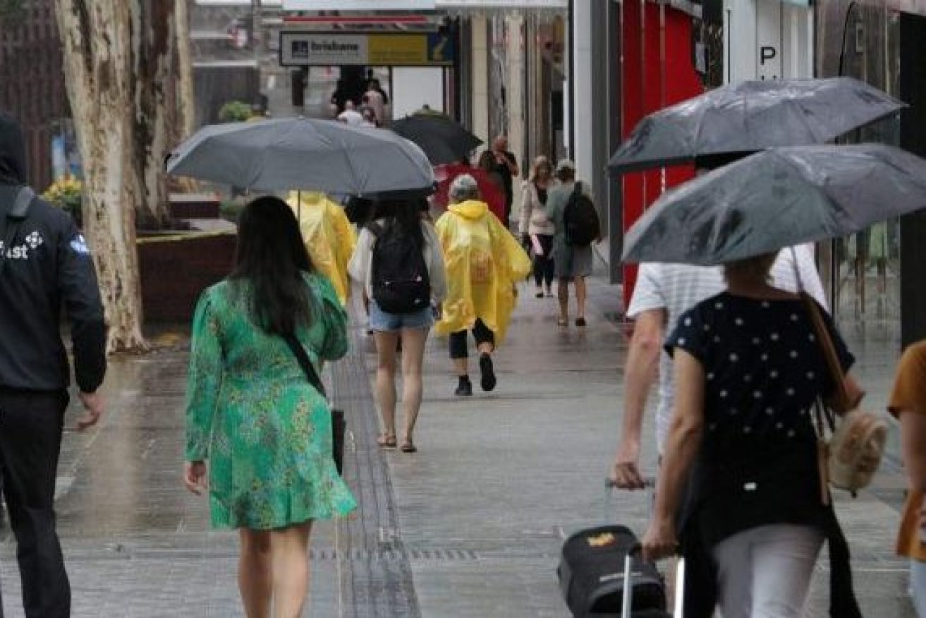 Average rainfall for the month of May was eclipsed in one day as rain, hail and flash flooding hit Queensland's south east overnight. Photo: ABC