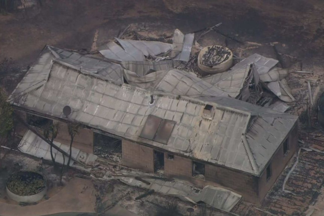 Multiple homes have been destroyed by the massive fire in the Perth Hills. Photo: ABC