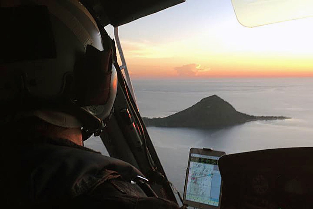 A helicopter retrieval in the Torres Strait. (AAP Image/Facebook, Queensland Ambulance Service) 