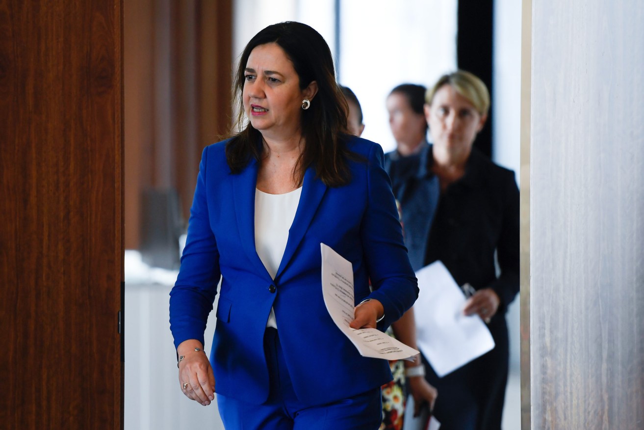 
Despite being well represented in parliament and State Cabinet, Queensland women are falling further behind their male colleagues in the pay stakes(AAP Image/Albert Perez)  