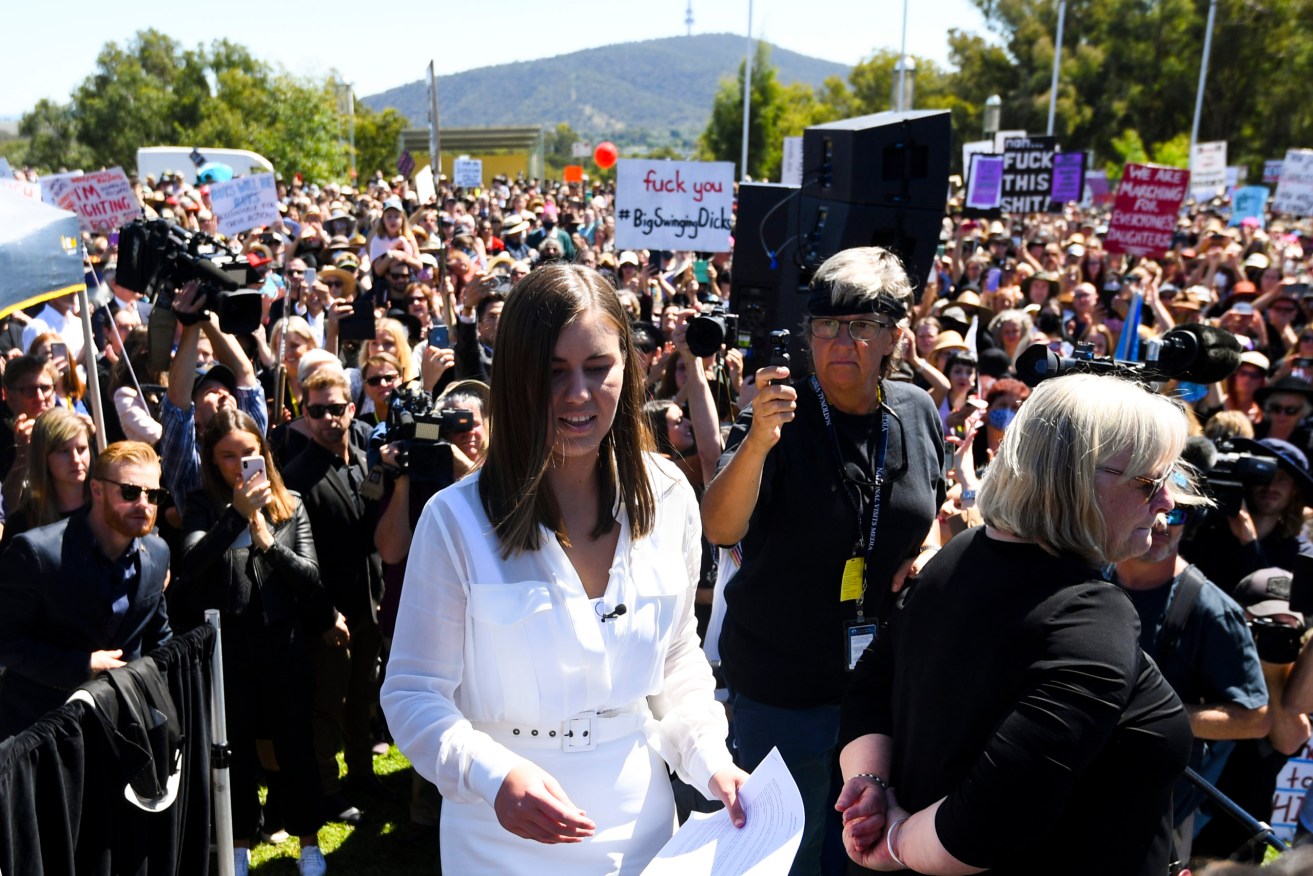 Former Liberal staffer Brittany Higgins arrives to address the Women's March 4 Justice in Canberra, Monday, March 15, 2021. Marches are being held around the country to raise awareness of sexual harassment against women in government and workplaces. (AAP Image/Lukas Coch) 