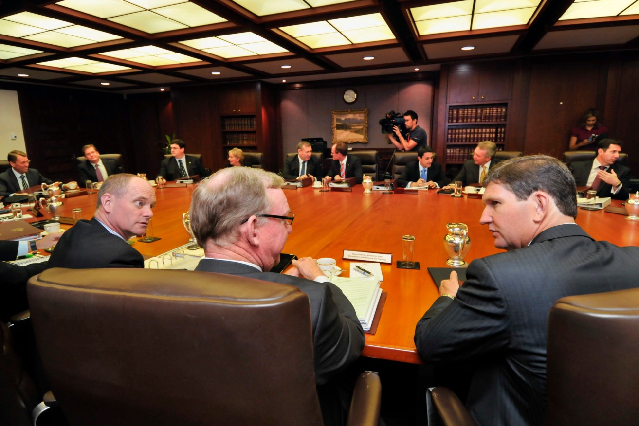 Then Queensland Premier Campbell Newman (left) talks to Jeff Seeney (middle) and Lawrence Springborg (right) ahead of the LNP Government's first Cabinet meeting in 2012. (AAP Image/John Pryke) 