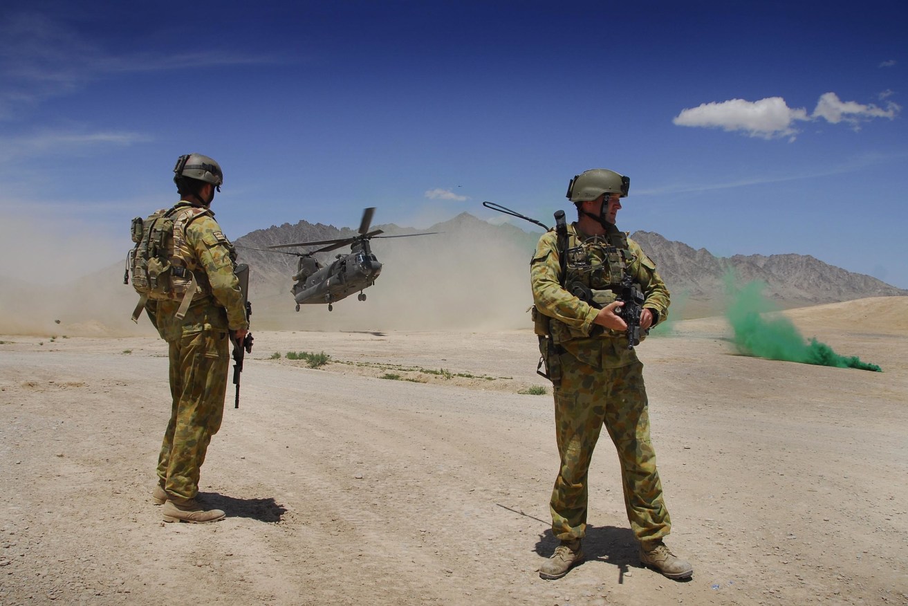 Australians soldiers provide security at a helicopter landing zone in Afghanistan in 2013.  (Photo: AAP Image/ADF) 