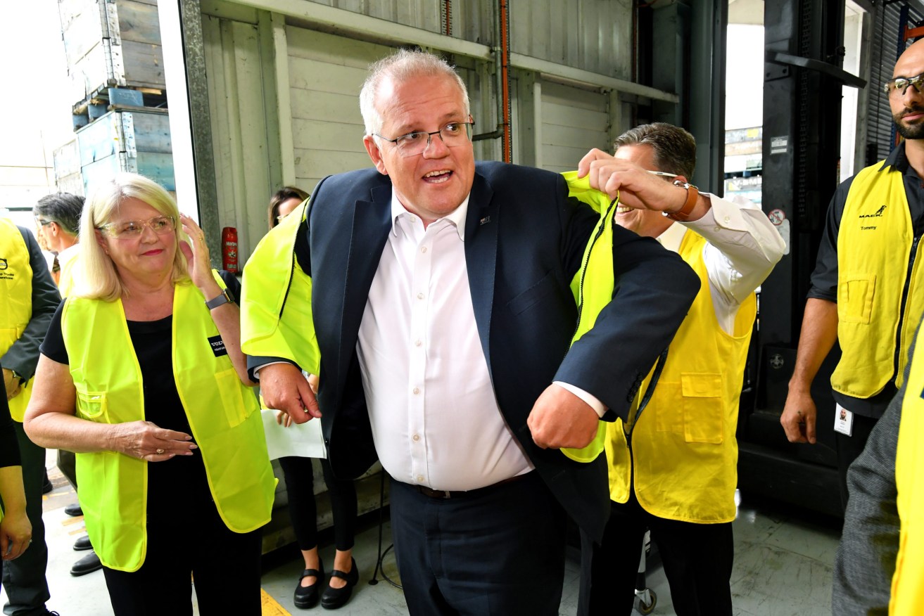 Prime Minister Scott Morrison says Australia is on the right path with its pandemic strategy. (AAP Image/Darren England)