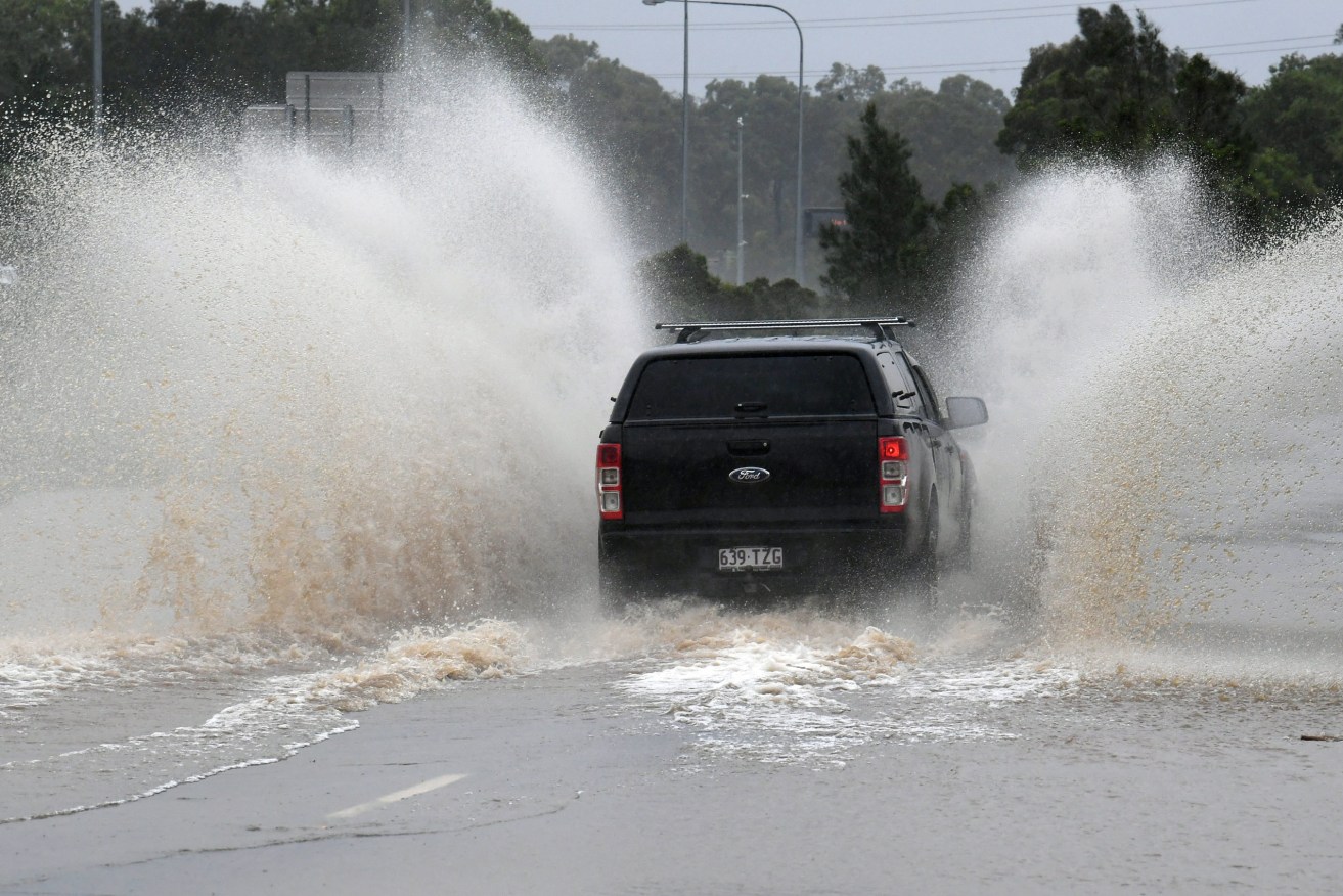 Emergency services are urging caution on the roads during the latest big wet.