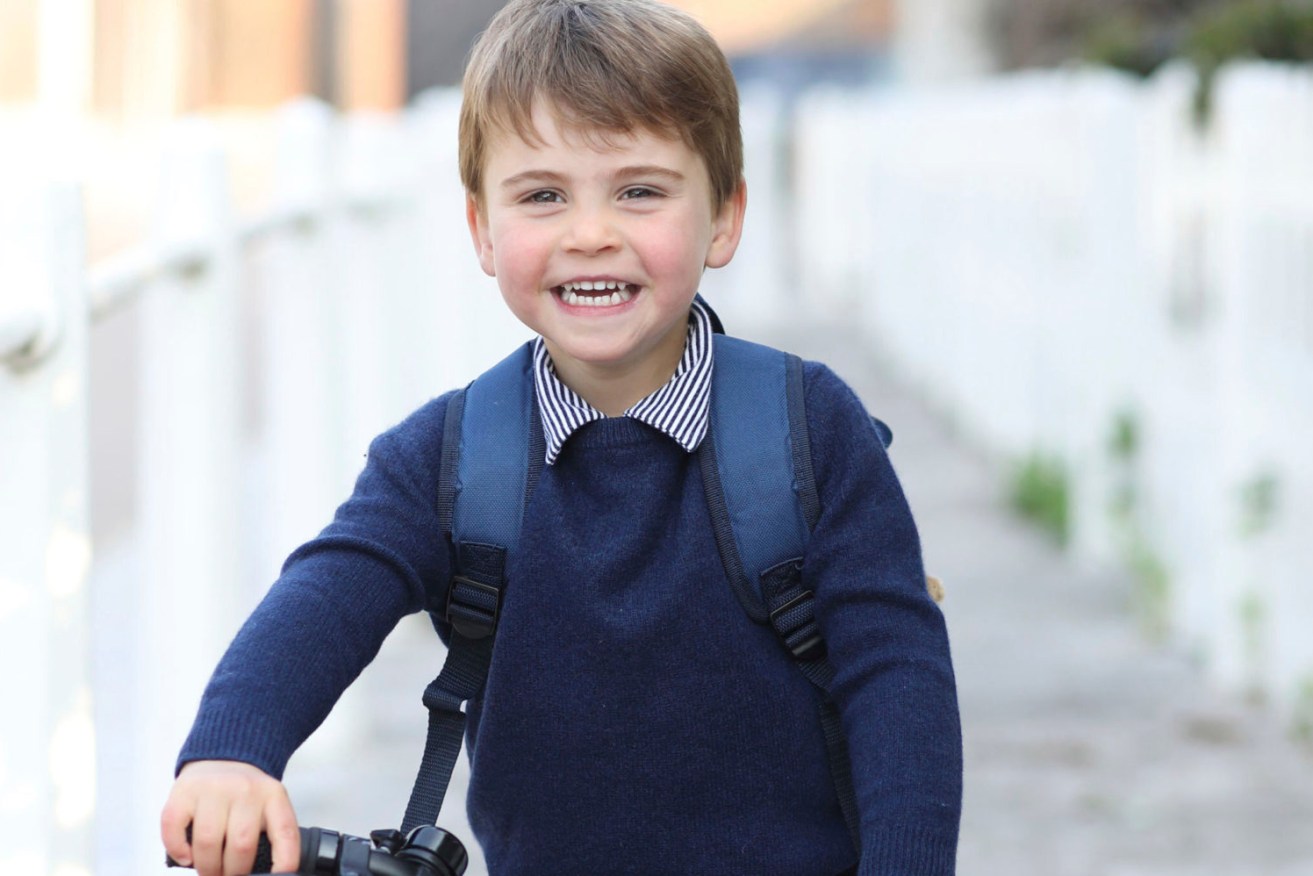 In this handout photo provided by the Duchess of Cambridge, Britain's Prince Louis smiles before his first day of attending Willcocks Nursery School, at Kensington Palace in London. Prince Louis turns three years old on Friday April 23. (Duchess of Cambridge via AP)