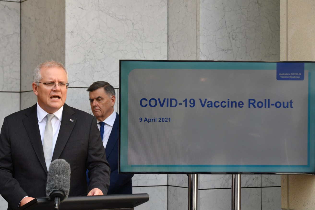 Prime Minister Scott Morrison and Department of Health Secretary Dr Brendan Murphy at a press conference at Parliament House in Canberra. (AAP Image/Mick Tsikas) 