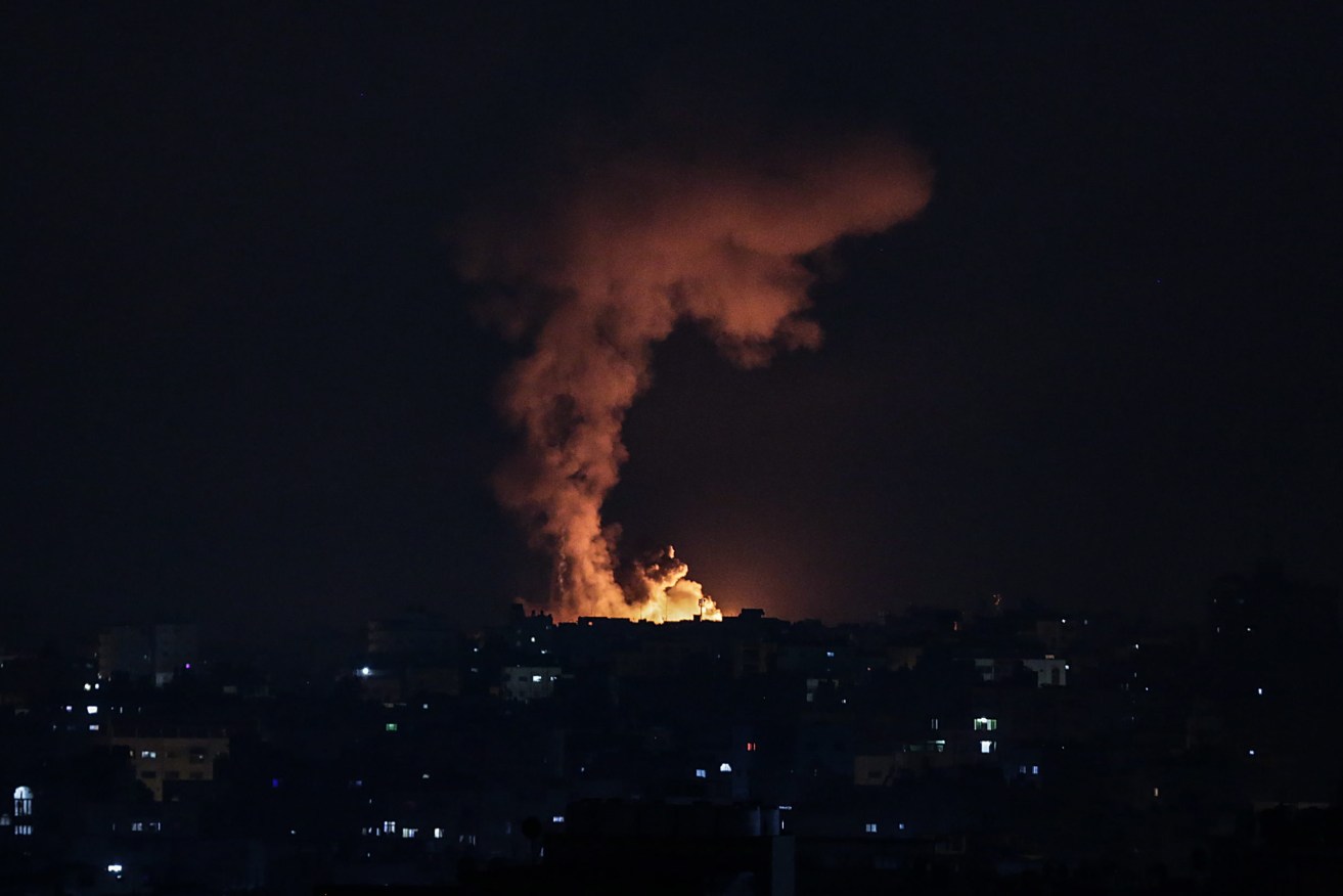  Smoke and flames rise after an Israeli airstrike in the northern Gaza strip In response to days of violent confrontations between Israeli security forces and Palestinians in Jerusalem.  (EPA/HAITHAM IMAD)