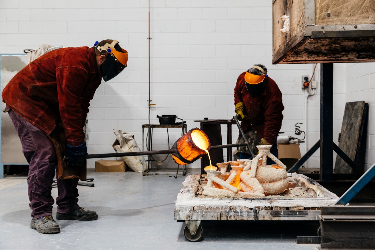 Phillip Perides and workshop colleagues prepare bronze castings at Perides Fine Art Foundry, in preparation and production of artist Hiromi Tango's collaborative artwork 'Roots' 2020, commissioned by the Brisbane City Council for the Platform Project.