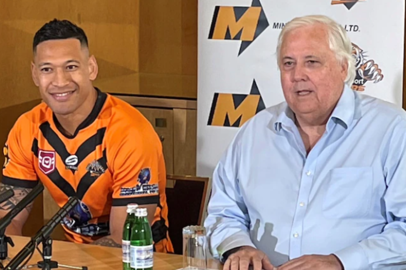 Israel Folau and Clive Palmer at a media conference in May announcing his plans to return to rugby league with a team sponsored by Palmer (ABC image).