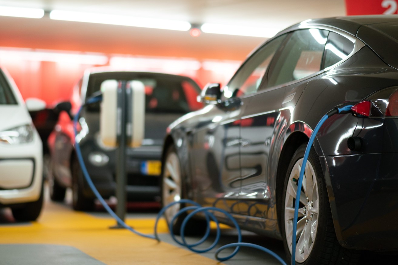 Electric vehicle being charged. Photo: Michael Fousert/Unsplash