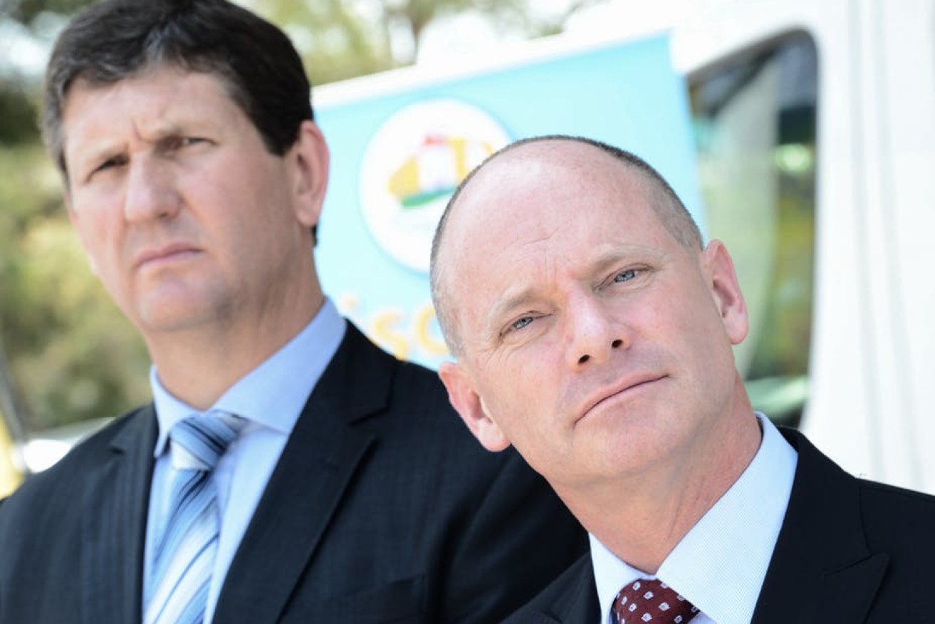 Coming and going: Former LNP parliamentary leaders Lawrence Springborg, left, who has just returned to the party as its new president; and ex-Premier Campbell Newman, who has quit the party in a fit of pique. (Photo: AAP)