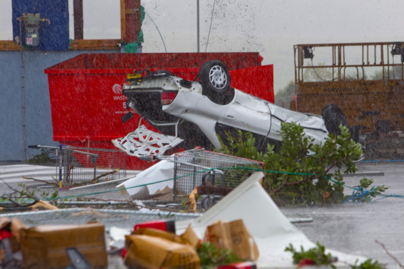 Destruction following a tornado hitting Albany, Auckland.  A New Zealander is reported dead and others injured in a tornado which has hit Auckland's North Shore.  (AAP Image/NZPA / David Rowland) 
