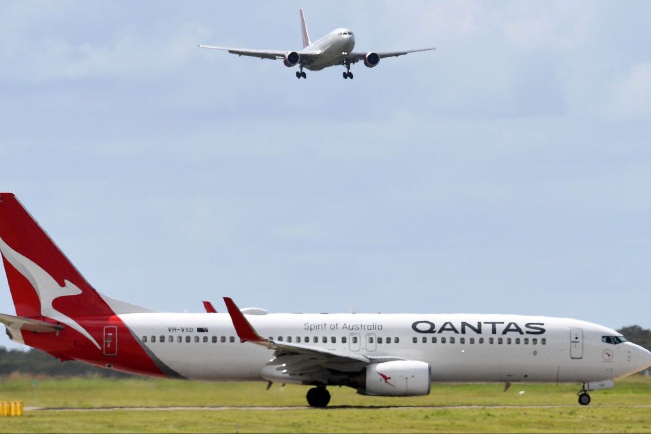 Brisbane Airport has made claims of huge cost for curfews. (AAP Image/Dan Peled)