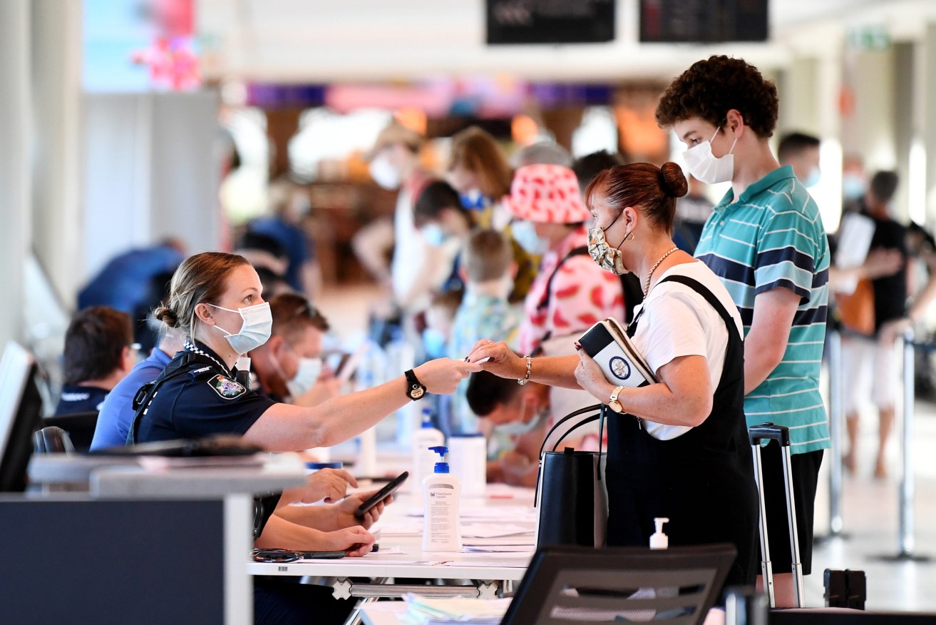 Queensland police are checking incoming air passengers to make sure they have not come from the Greater Sydney hotspots. (AAP Image/Dan Peled) 
