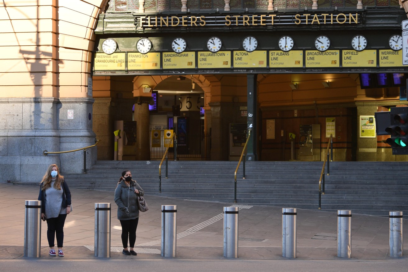 A near deserted Flinders St station in the heart of Melbourne. The city's current lockdown has been extended for at least another seven days. (AAP Image/James Ross) 