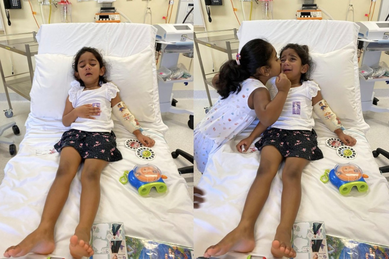 Tharnicaa, the youngest daughter of the ‘Biloela family’, after being hospitalised on Christmas Island with a suspected blood infection.  (AAP Image/Supplied by Change.org Australia)