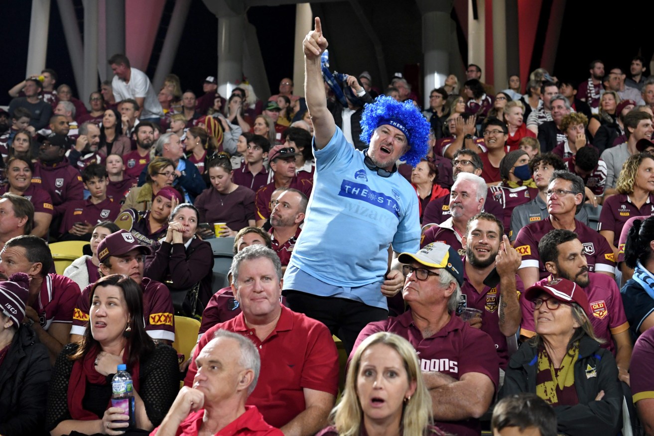 Blues supporters will be few and far between for Sunday night's State of Origin rematch at Suncorp Stadium after Queensland closed its borders to Sydney residents (AAP Image/Darren England)