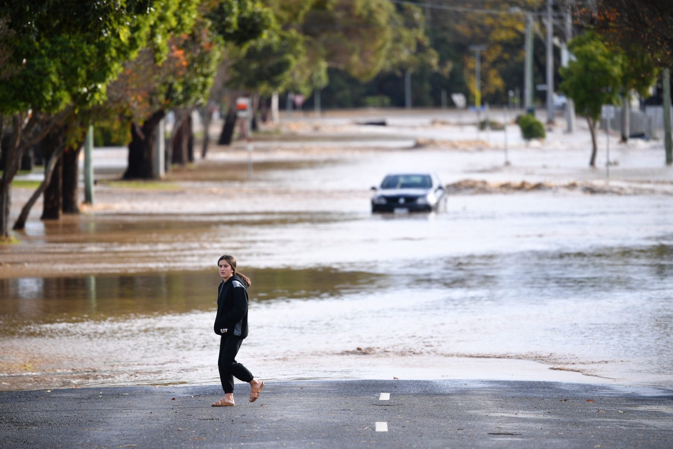 Rising floodwaters have prompted an evacuation warning for parts of a town in the Victorian region of Gippsland, as heavy rain and wild winds hit the state. (AAP Image/James Ross) 
