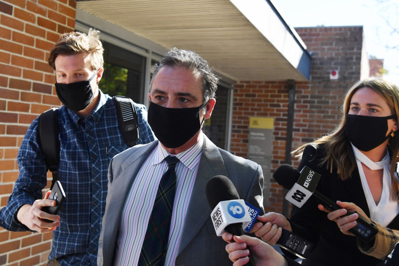 Andrew O'Keefe leaves the Waverley Local Court after his appearance last year where he faced charges of domestic assault. He has now been granted bail to undergo rehab. (AAP Image/Dean Lewins)