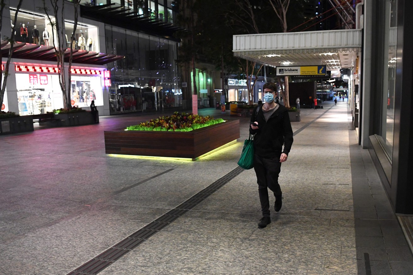 Brisbane's Queen Street Mall was almost abandoned after the state government declared a three-day lockdown.   (AAP Image/Darren England) 