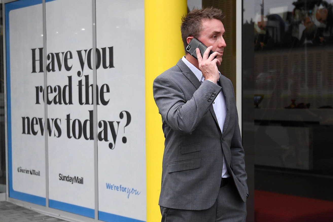 One Nation party official James Ashby walks from a press conference in Brisbane. (AAP Image/Dave Hunt) 