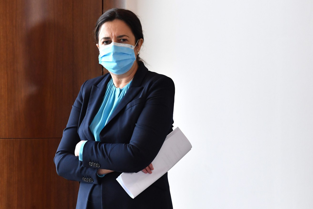 Premier Annastacia Palaszczuk denies using polling to guide her pandemic decisions. (AAP Image/Darren England) 