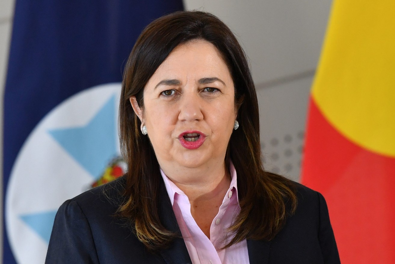  Premier Annastacia Palaszczuk has urged Queenslanders in regional NSW to come home but has so far resisted shutting the border. (AAP Image/Darren England) 