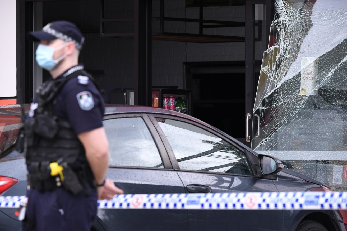 Two Gold Coast workers have burns to their faces, limbs and bodies after a blast tore through a new cafe while they were testing its gas system. (AAP Image/Dave Hunt)