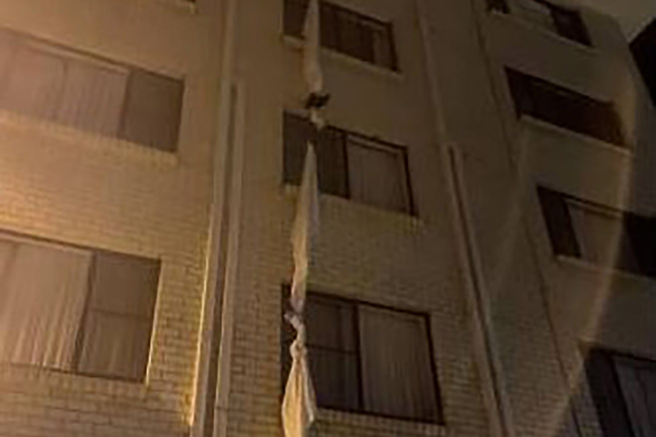 A supplied image shows a rope made of bedsheets used by a Queensland man to escape hotel quarantine in Perth, Tuesday. (AAP Image/Supplied by WA Police) 