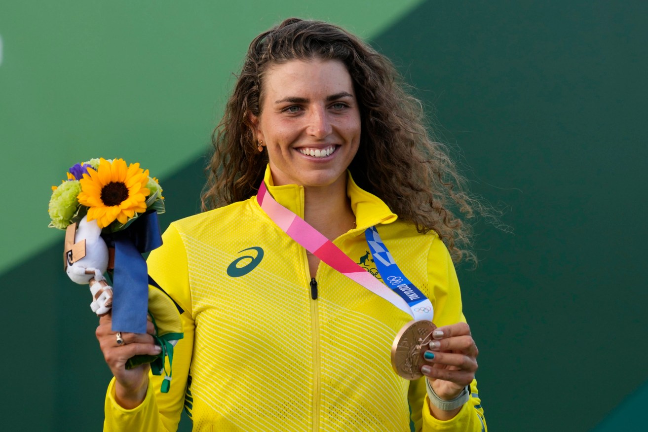 Jessica Fox of Australia holds the bronze medal during the ceremony for the Women's K1 of the Canoe Slalom. (AP Photo/Kirsty Wigglesworth)
