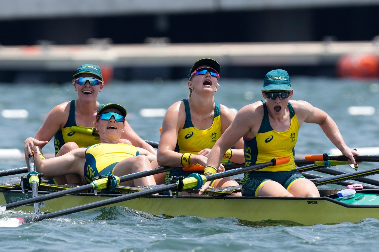 Ria Thompson, Rowena Meredith, Harriet Hudson and Caitlin Cronin of Australia celebrate after winning bronze in the women's rowing quadruple sculls final at the 2020 Summer Olympics, Wednesday, July 28, 2021, in Tokyo, Japan. (AP Photo/Darron Cummings)