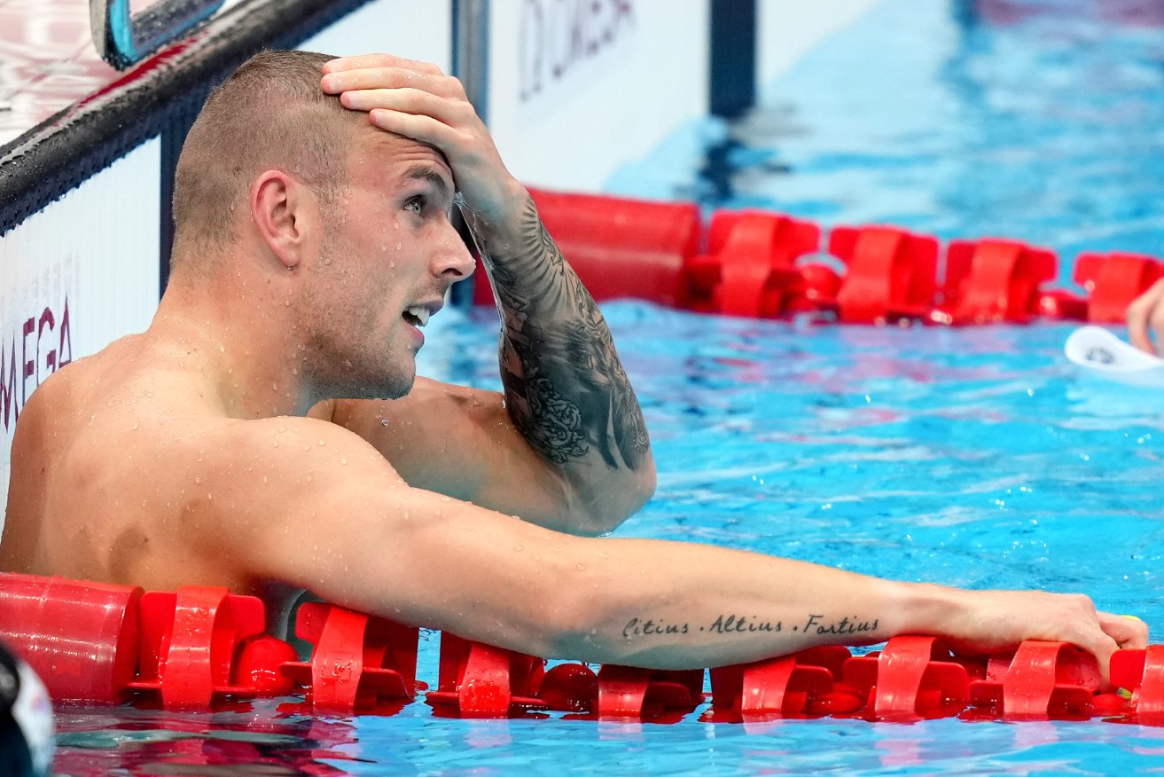 Kyle Chalmers of Australia reacts after winning silver and being narrowly beaten by Caeleb Dressel of the USA in the Men’s 100m Freestyle Final at the Tokyo Aquatics Centre during the Tokyo Olympic Games in Tokyo, Japan, Thursday, July 29, 2021. (AAP Image/Joe Giddens) 
