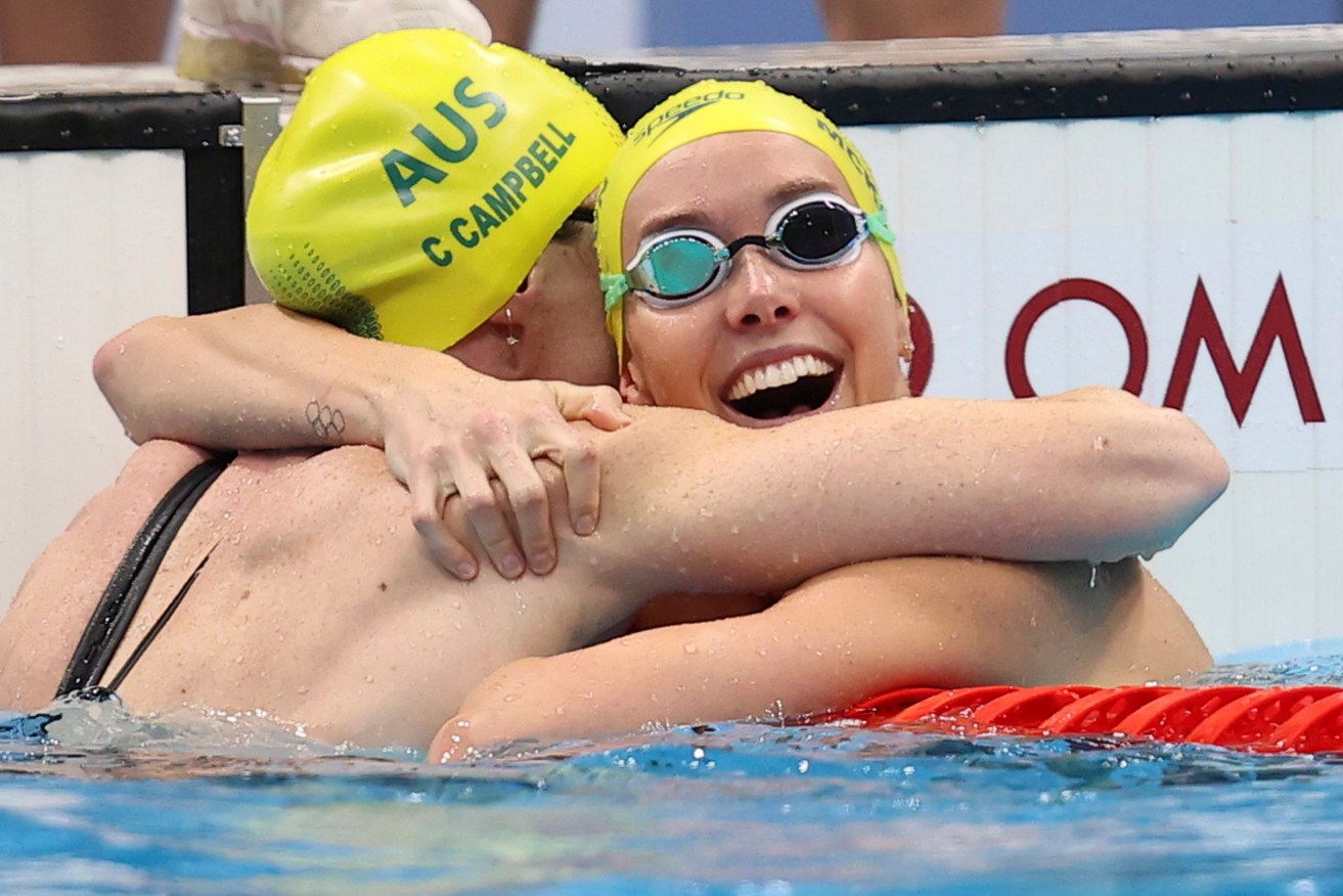 Australia's Emma McKeon (R) reacts after winning the Women's 100m Freestyle final at Tokyo Aquatics Centre in Tokyo in July last year. ( The Yomiuri Shimbun via AP Images )