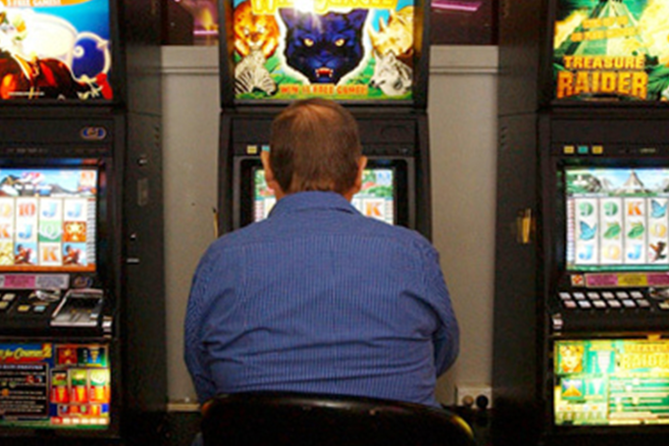 The Queensland Government wants to minimise harm from gambling. (AAP Image: Mick Tsikas)