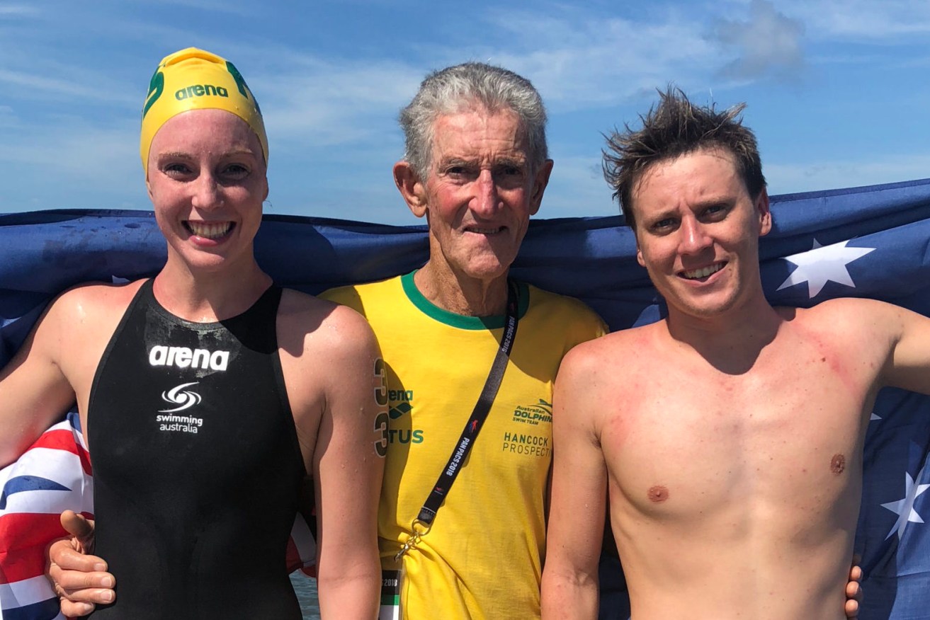 Australian swim coach John 'JR' Rodgers (centre) with Kareena Lee (left) and Nick Sloman. Rodgers was the first person Lee contacted after winning Australia's first ever marathon swimming medal.. (AAP Image/Ian Hanson) 