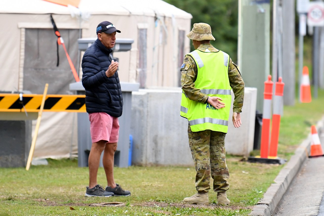 Defence Force personnel will return to the border on the Gold Coast, where they were a year ago, helping police enforce restrictions. (AAP Image/Dan Peled)